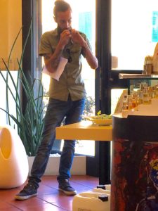 Delivery man happily waits for a simple signature.