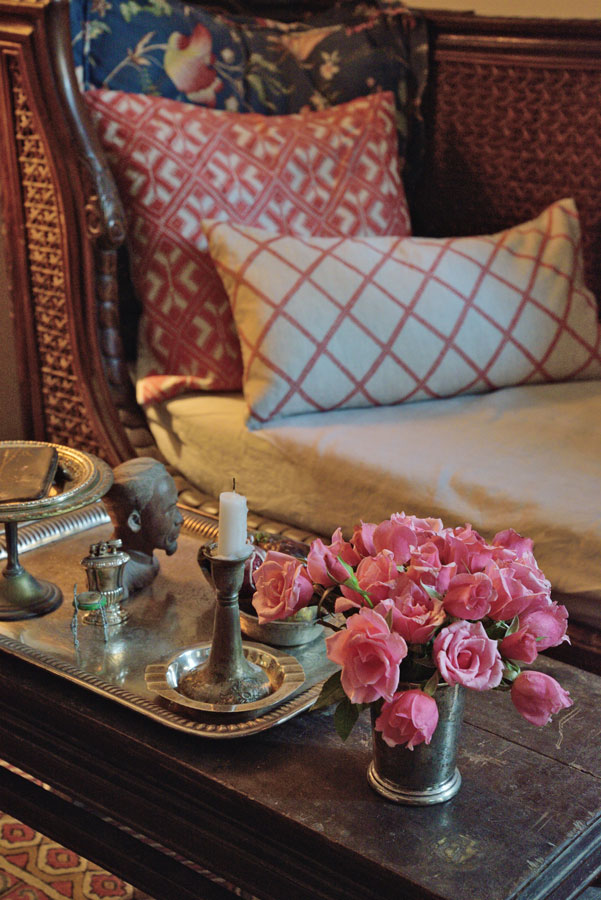 Mix your personal finds with flowers for a pop of color and touch of the natural.