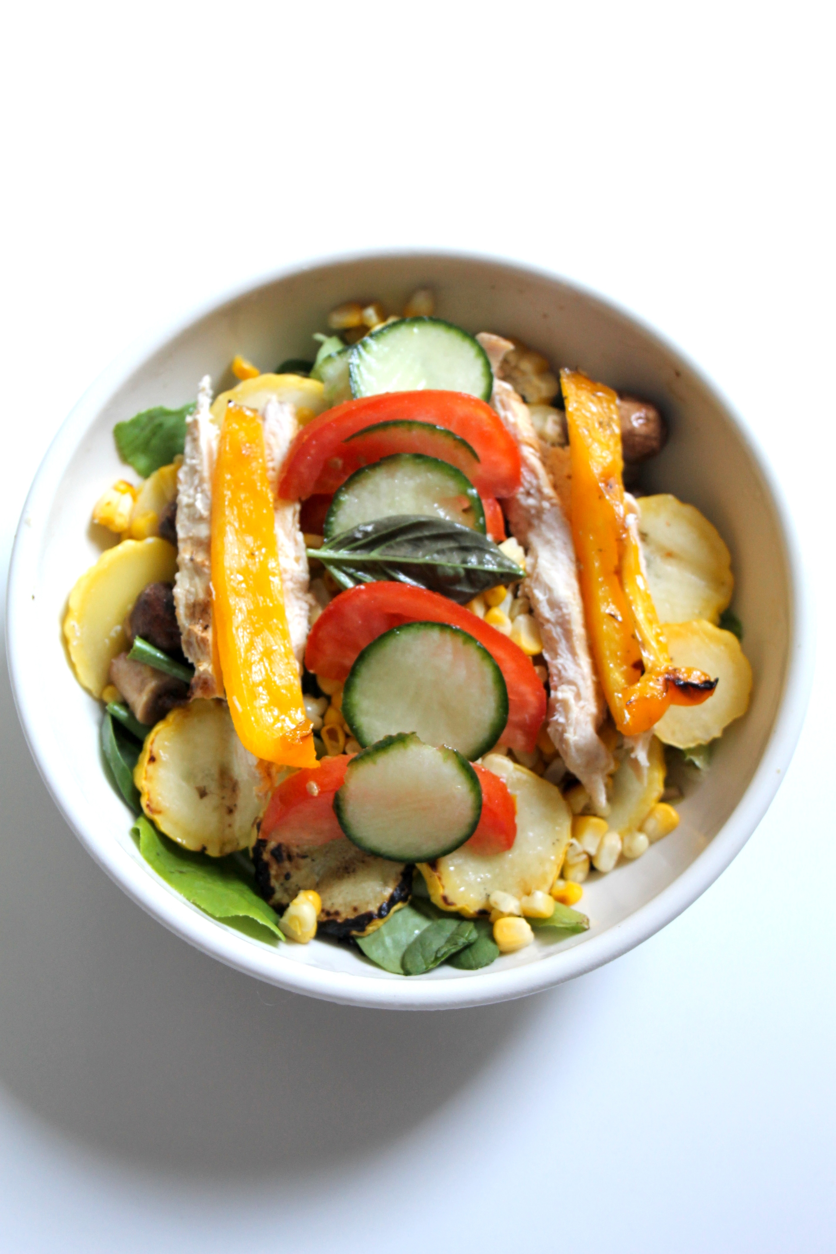 A combination of grilled vegetables and toppings chosen for color, texture and taste compose a first rate salad.