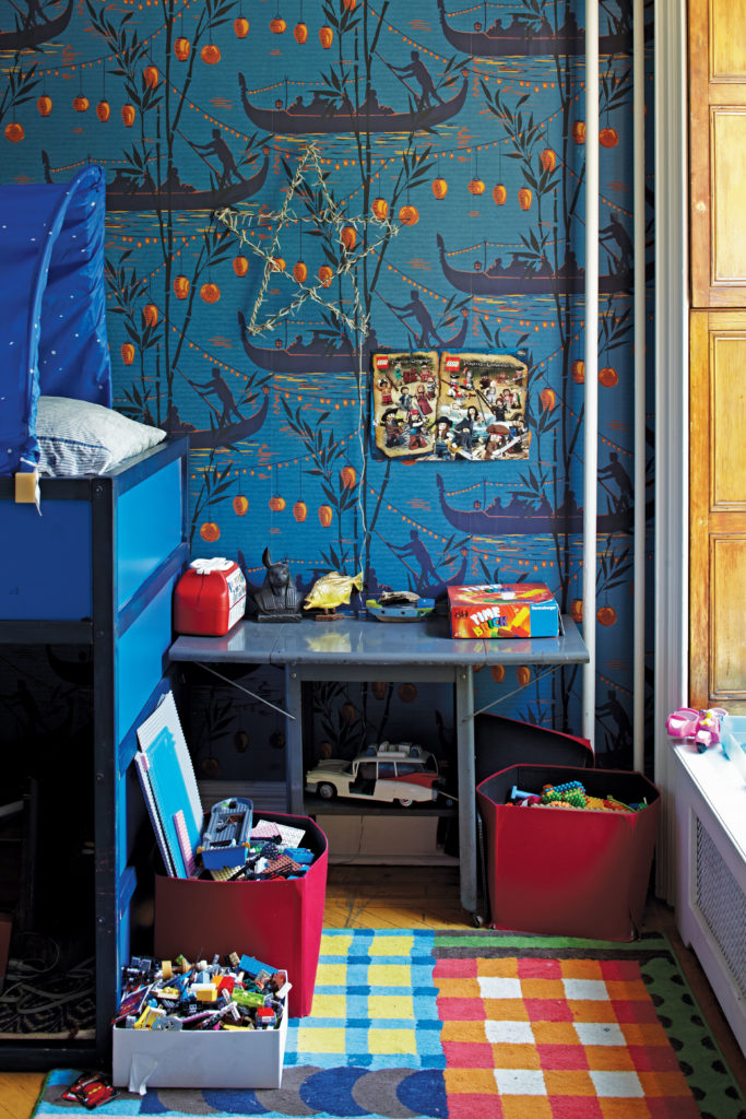 boy's room designed with an attention to colors, wallpaper and fine pieces, copyright by David A. Land.