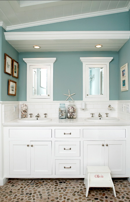 My Laguna Beach cottage bath kept the family together with dual sinks and mirrors. Olivia's step stool gave a growing girl independence.