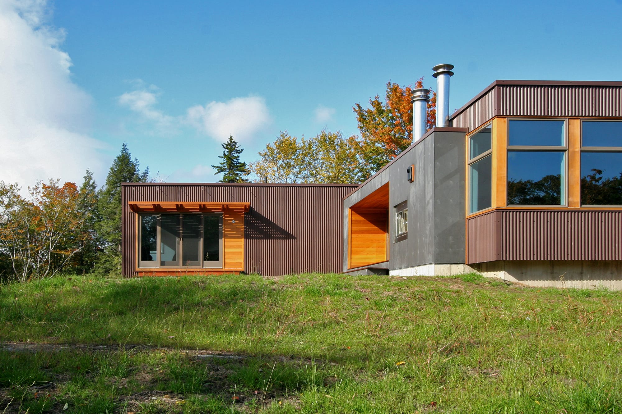 A Vermont prefab residence illustrates sustainable living via materials and design.