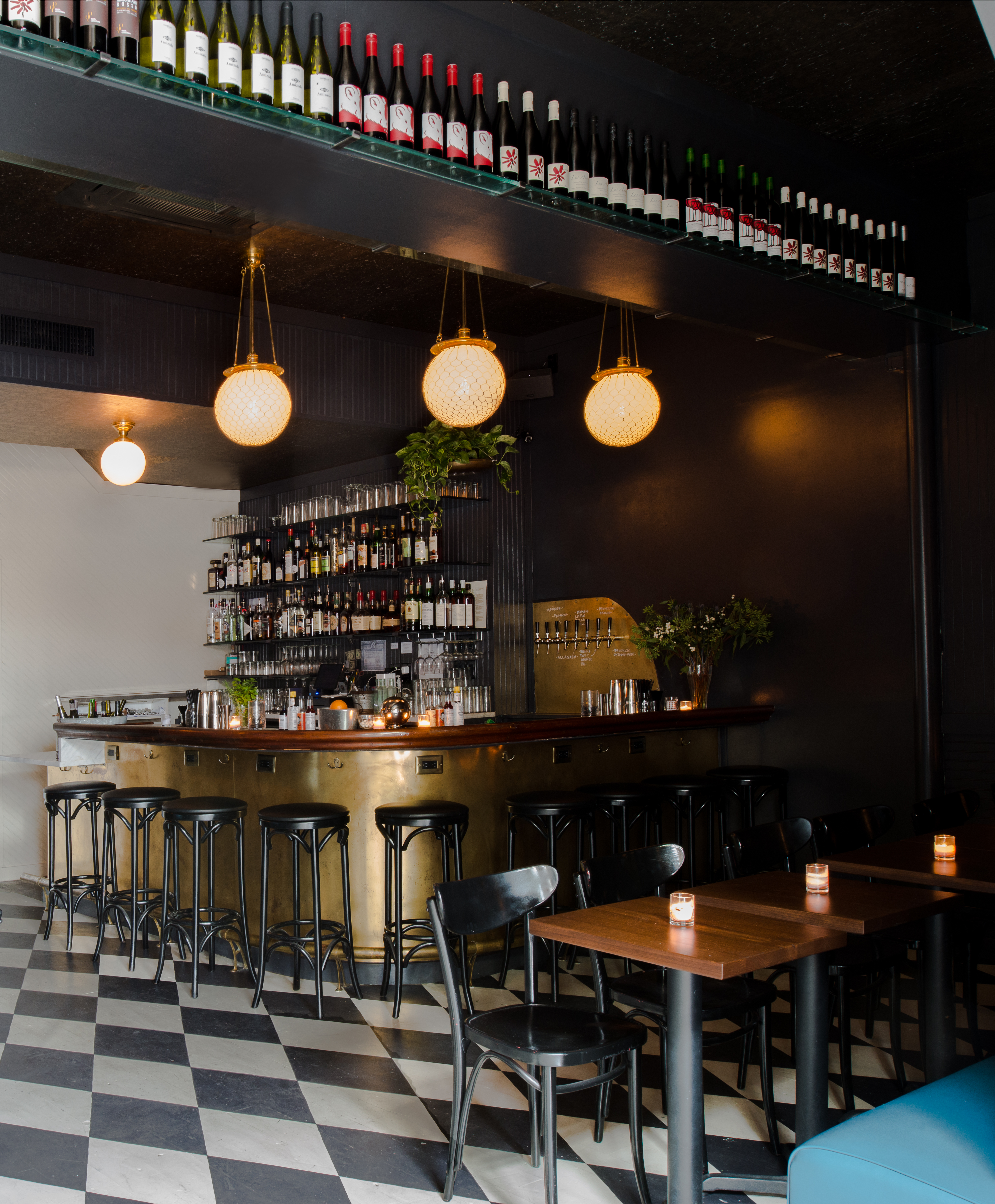 Bar lighting, sourced from Craigs List, blends with vintage finds. 